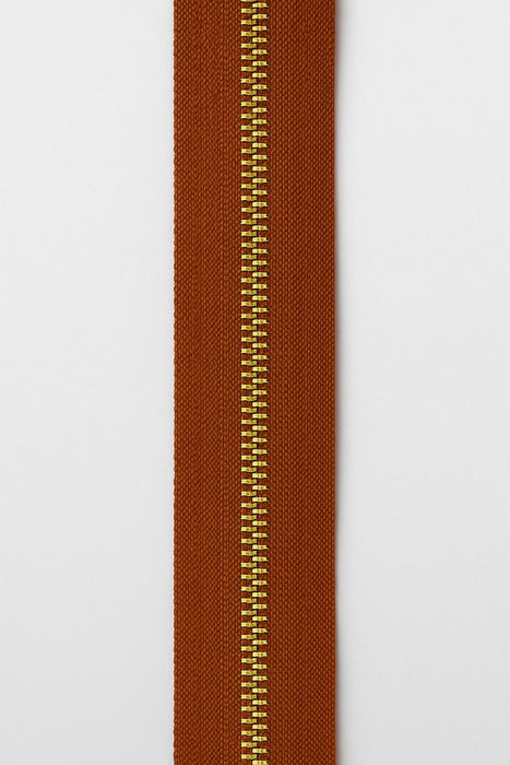 ZIPER Nº6 METAL COR CARAMELO COM DENTE DOURADO 10 METROS